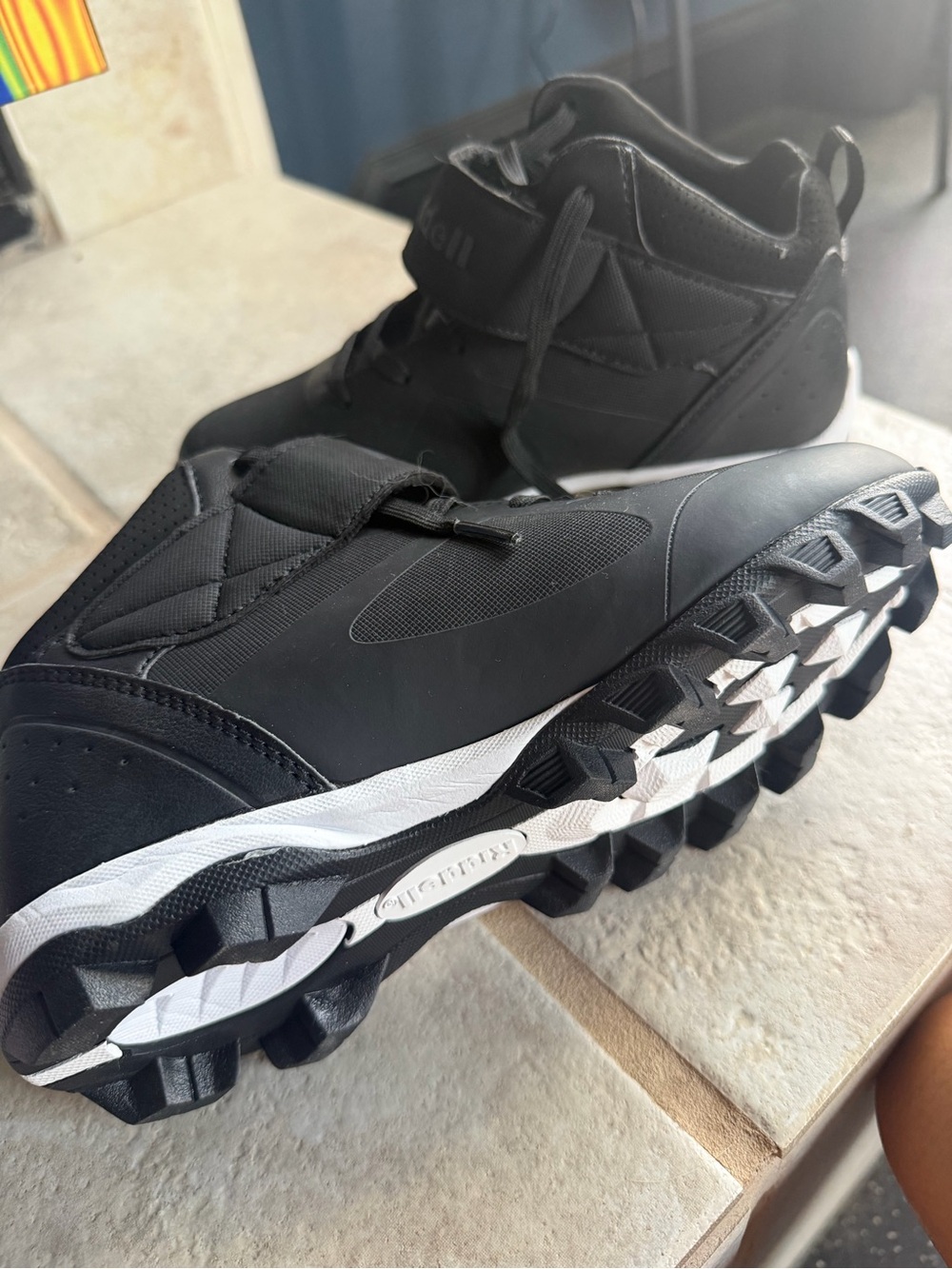 Youth size 3 Riddell high top cleats
